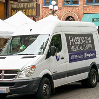 photo of Harborview van in front of Seattle Union Gospel Mission